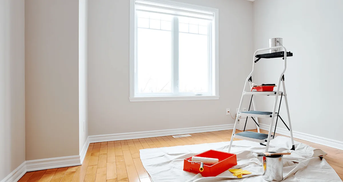 Interior wall area prepared for a coating application
