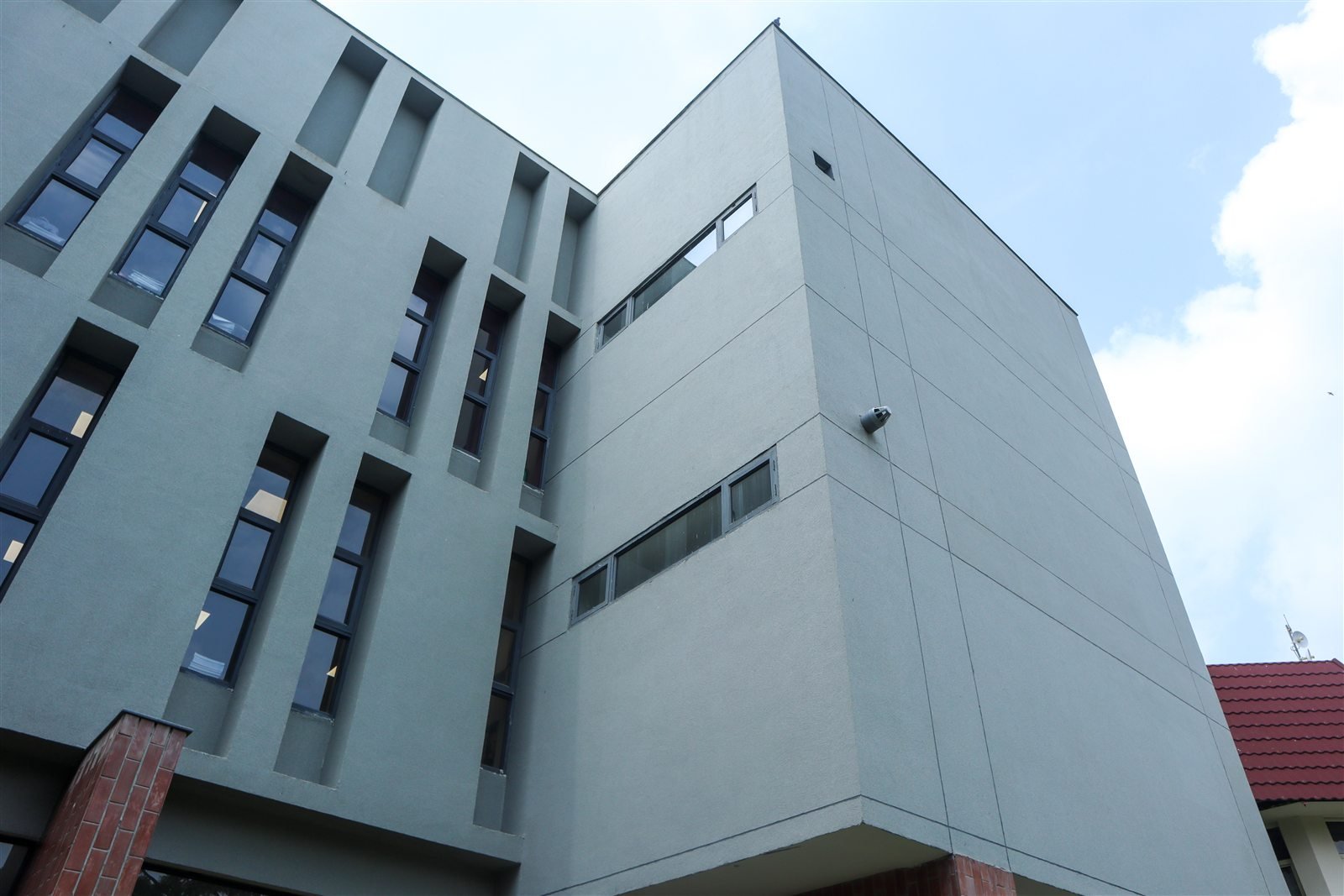 Institutional building volumes enhanced by Luxstone exterior texture