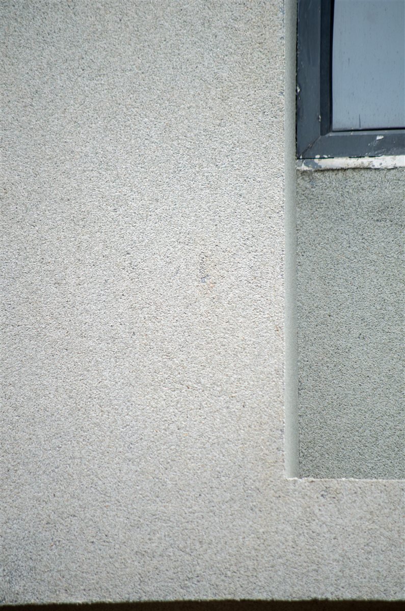 Close-up of the natural mineral character in Luxstone texture finish